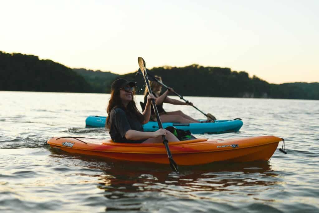 People kayaking on the water, a great experience for adventure gift vouchers.