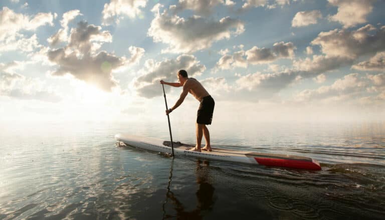 People paddleboarding, a fun experience with adventure gift vouchers.