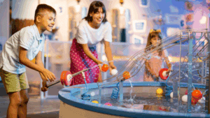 A family having fun with interactive indoor activities at a Cork-based play centre