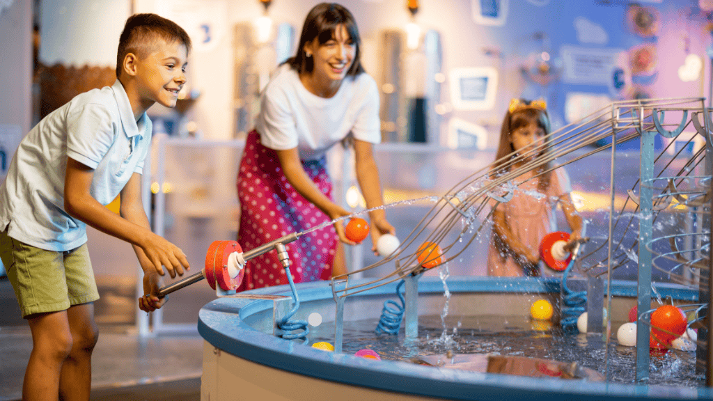 A family having fun with interactive indoor activities at a Cork-based play centre