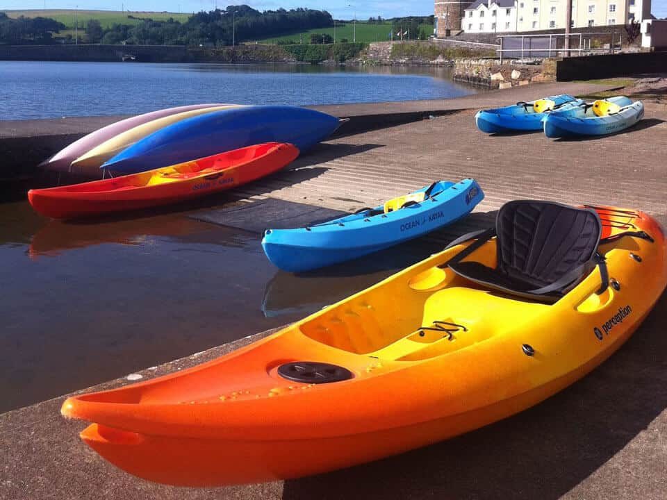 Colourful and ready to rent kayaks at the Lagoon Activity Centre