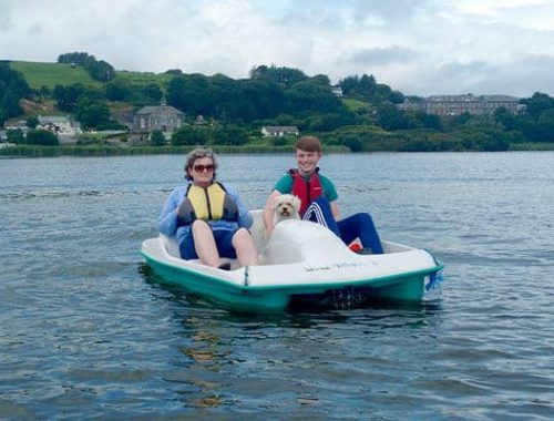 Two people on pedal boat in beautiful lagoon in West Cork
